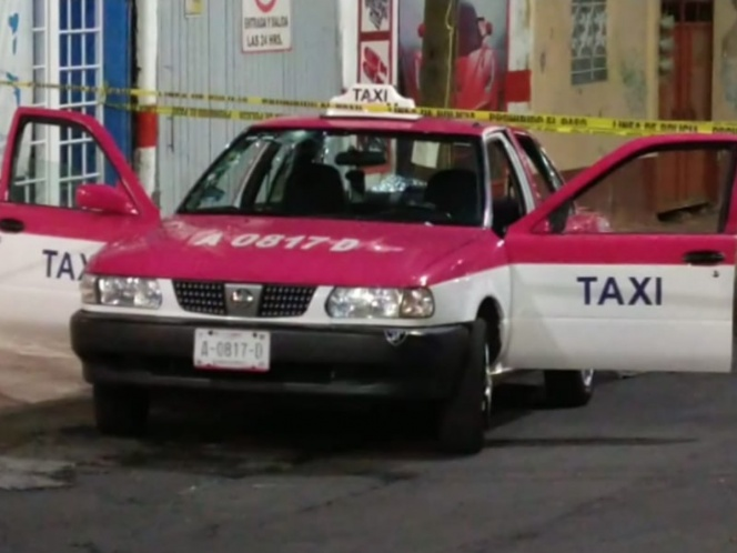 Matan a dos personas adentro de un taxi