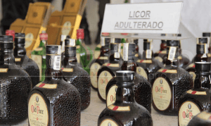 SAT pierde 112 mmdp por venta de licor adulterado