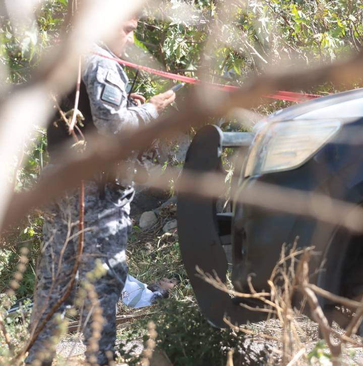 Encuentran cadáver de una mujer en una zona ejidal de Tultepec