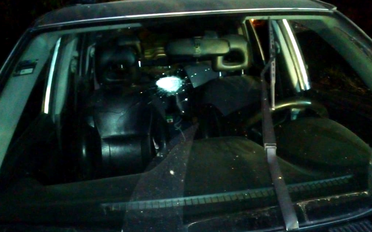 Encuentran cadáver con dos balazos en la cabeza dentro de una camioneta