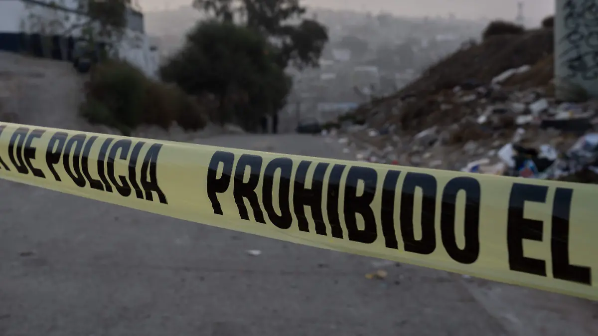 Investigan el hallazgo de un cadáver calcinado en Tultitlán